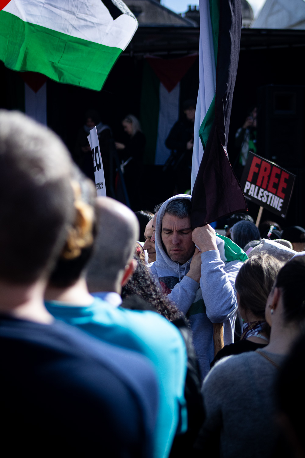 All the Noise two elder man standing in a lake